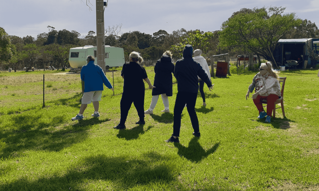 People exercising at the farm