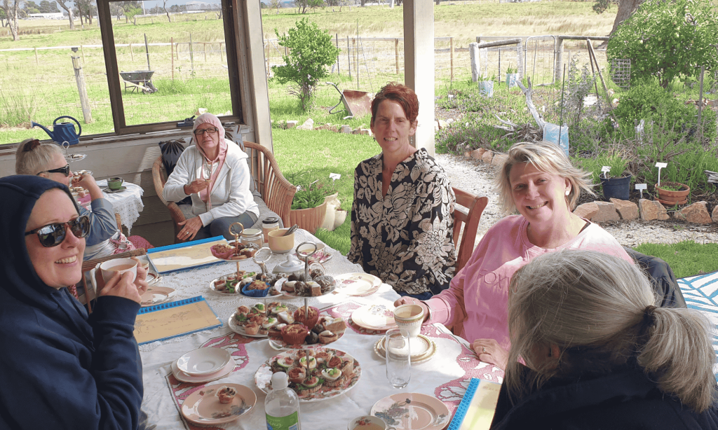 Group of women enjoying afternoon tea